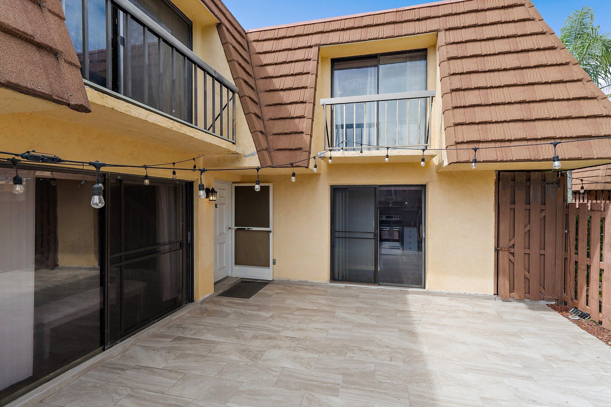825 Center Street, Unit 30A Jupiter, FL 33458 - Photo 4 of 33 a view of a building entrance
