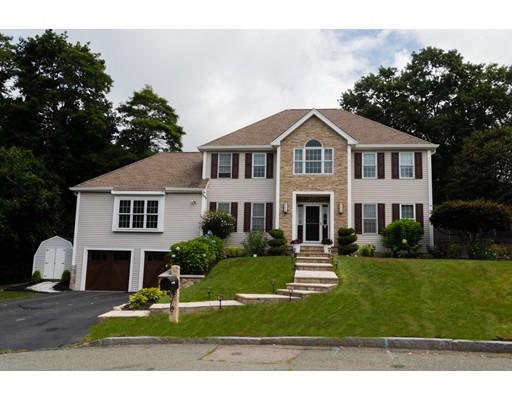 5 Luce Circle Canton, MA 02021 - Photo 1 of 24 a front view of a house with a yard