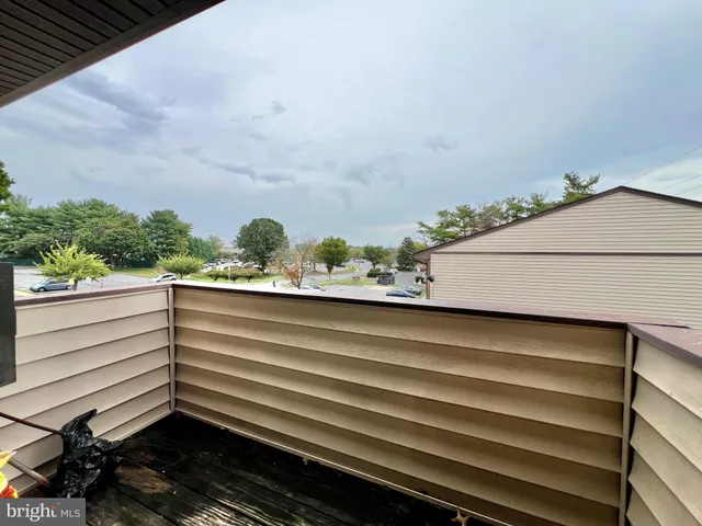 a view of a balcony with an outdoor space