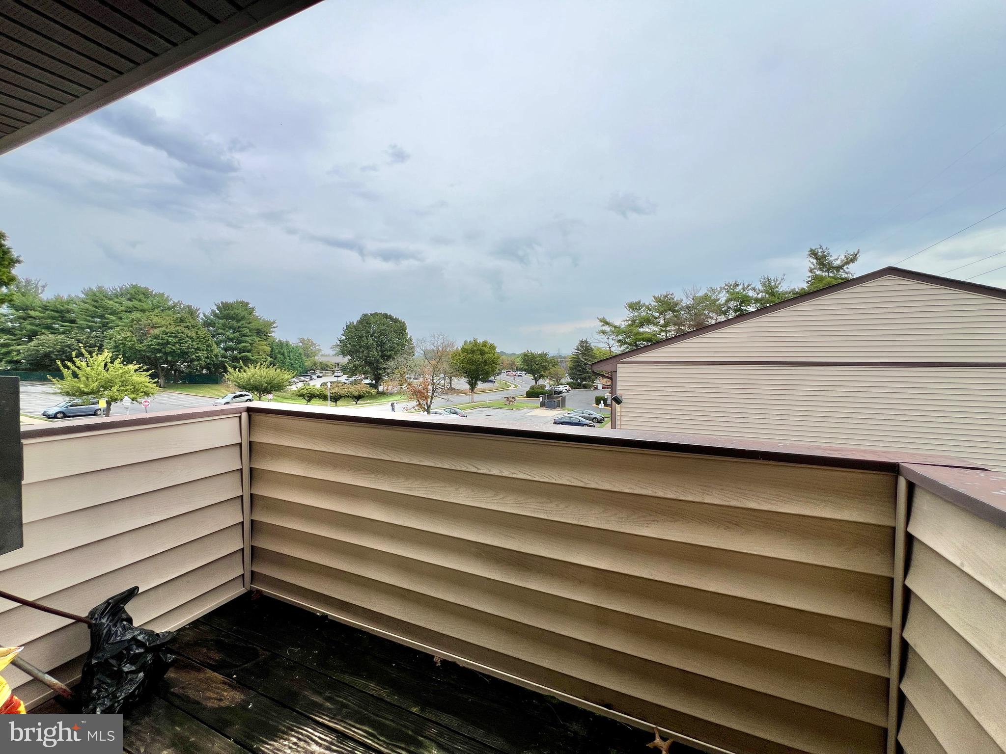 999 Heather Ridge Drive, Unit 2L Frederick, MD 21702 - Photo 15 of 19 a view of a balcony with an outdoor space