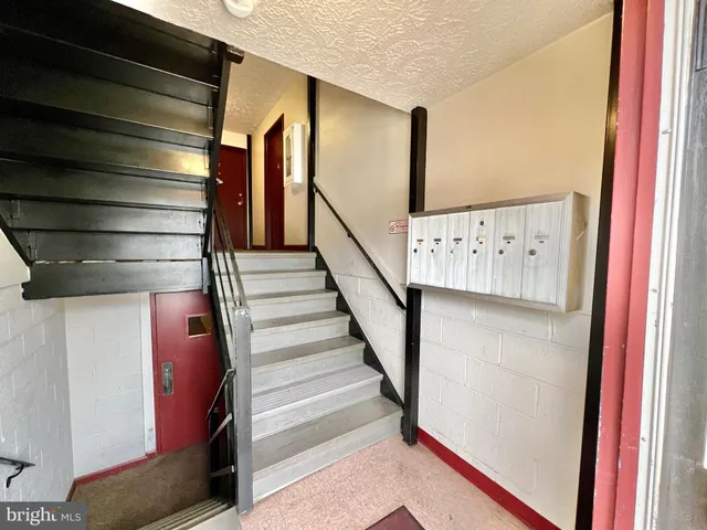 a car parked in front of a house