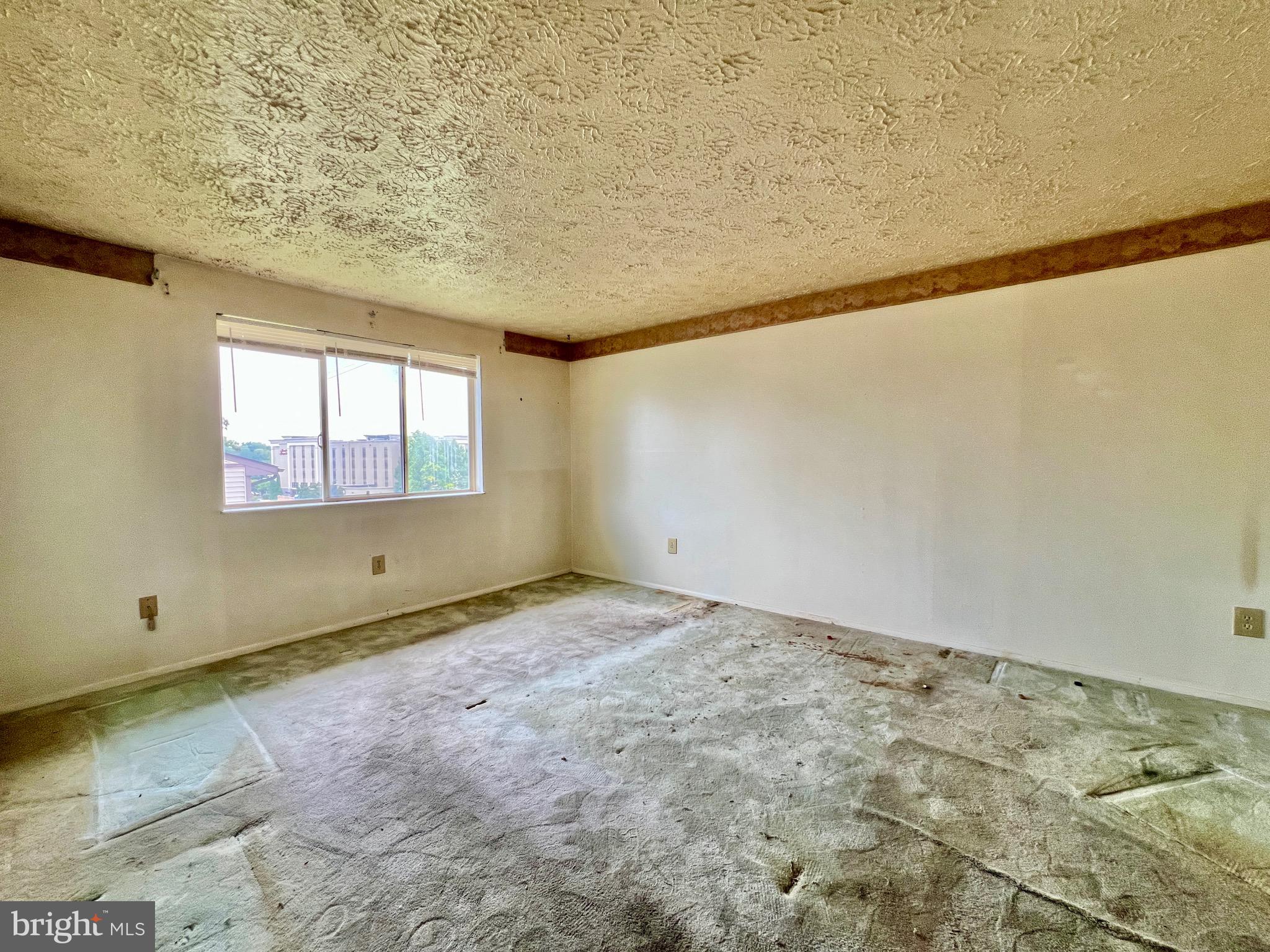 999 Heather Ridge Drive, Unit 2L Frederick, MD 21702 - Photo 8 of 19 a view of an empty room