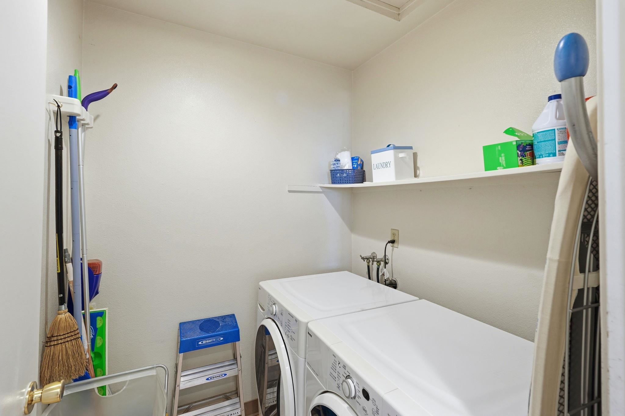 1643 West Swain Road Stockton, CA 95207 - Photo 24 of 27 a utility room with dryer and washer