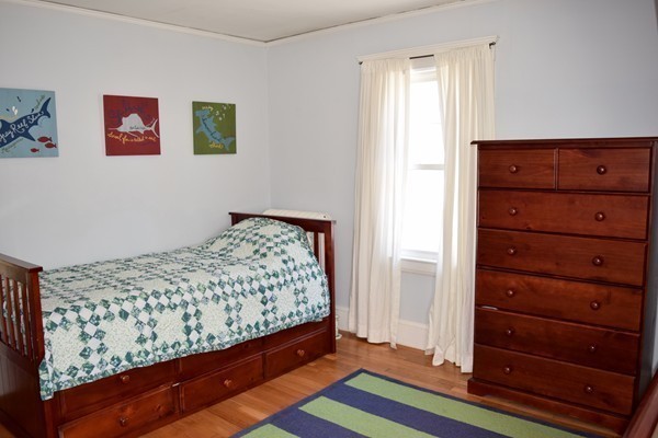 24 Norwell Road Dedham, MA 02026 - Photo 12 of 21 a bedroom with a bed and a window