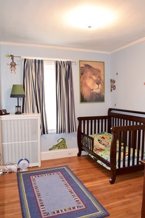 24 Norwell Road Dedham, MA 02026 - Photo 15 of 21 a view of a bedroom with furniture and staircase