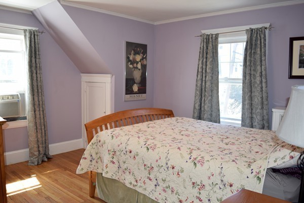 24 Norwell Road Dedham, MA 02026 - Photo 17 of 21 a bedroom with a bed and a window