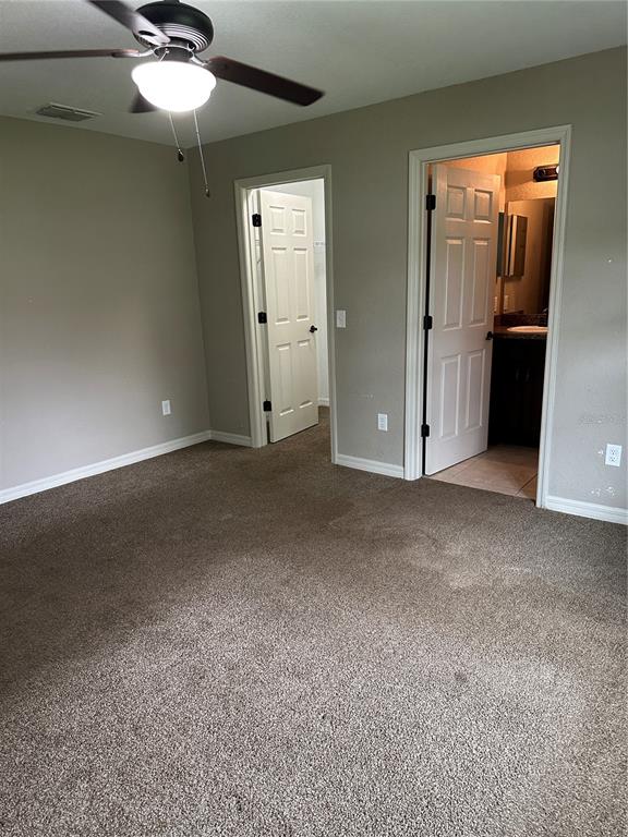 5663 Northwest 57th Street Ocala, FL 34482 - Photo 13 of 19 an empty room with a bathroom