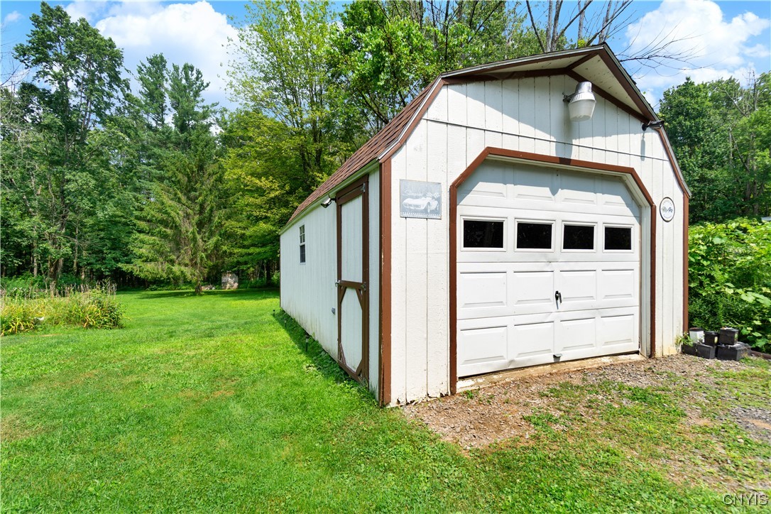 24 Coan Pond Road Amboy, NY 13493 - Photo 21 of 28 The garage