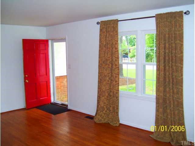 2608 Ramsey Road Raleigh, NC 27604 - Photo 4 of 12 a bedroom with a bed and a window
