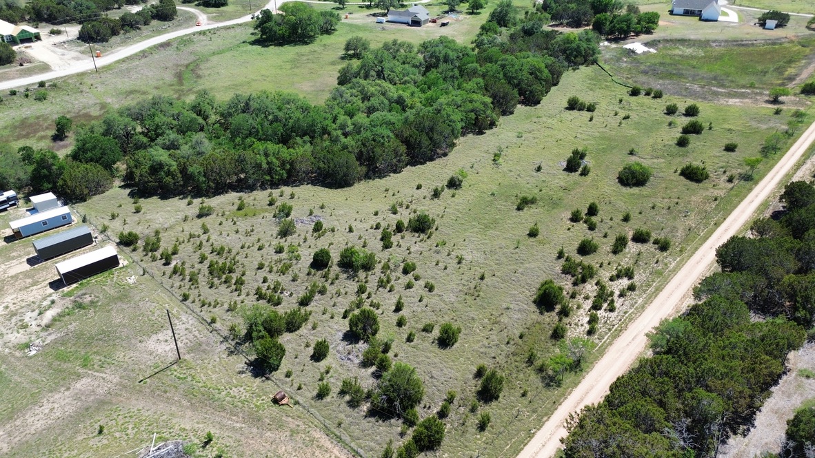 Lot 36 Garner Ranch Road Bertram, TX 78605 - Photo 11 of 12 a view of a yard with plants