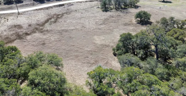 a view of a swimming pool with sitting area
