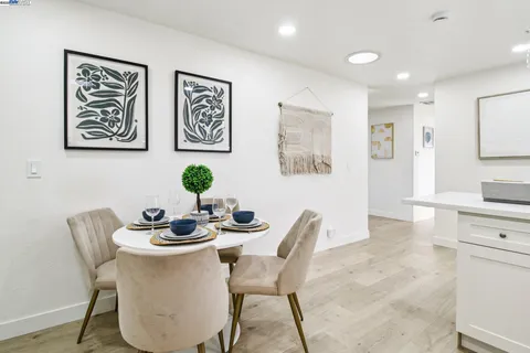 a view of a dining room with furniture