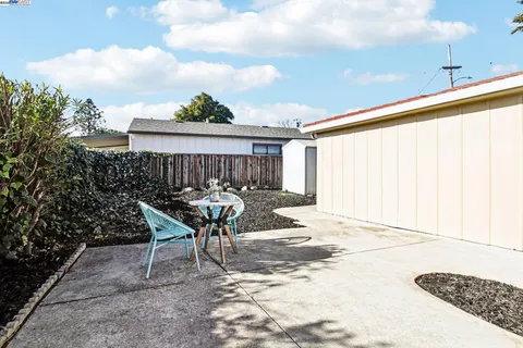 a view of multiple houses with a street