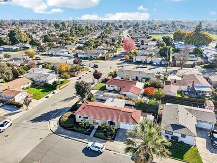 an aerial view of a city with lots of residential buildings