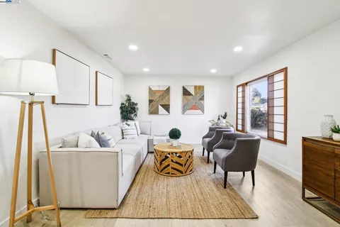 a living room with furniture and a couch