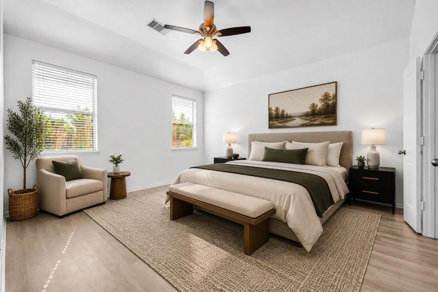 4707 Waukegan Road Conroe, TX 77306 - Photo 17 of 31 A staged view of the primary bedroom, picturing a king-sized bed with ample extra space. (Virtually Staged)