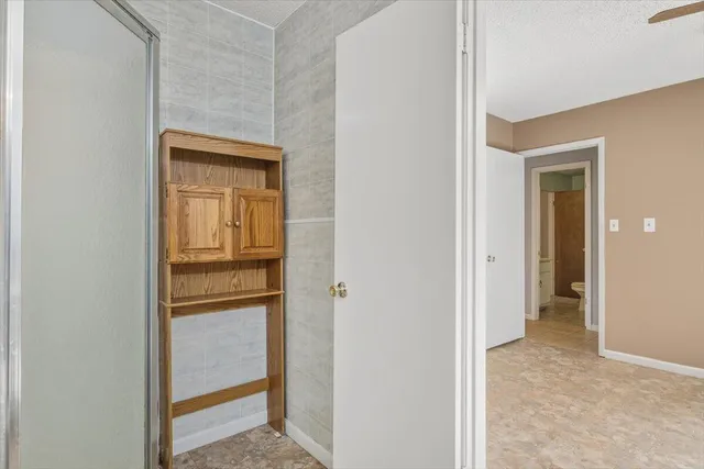 a front view of a house with a trees