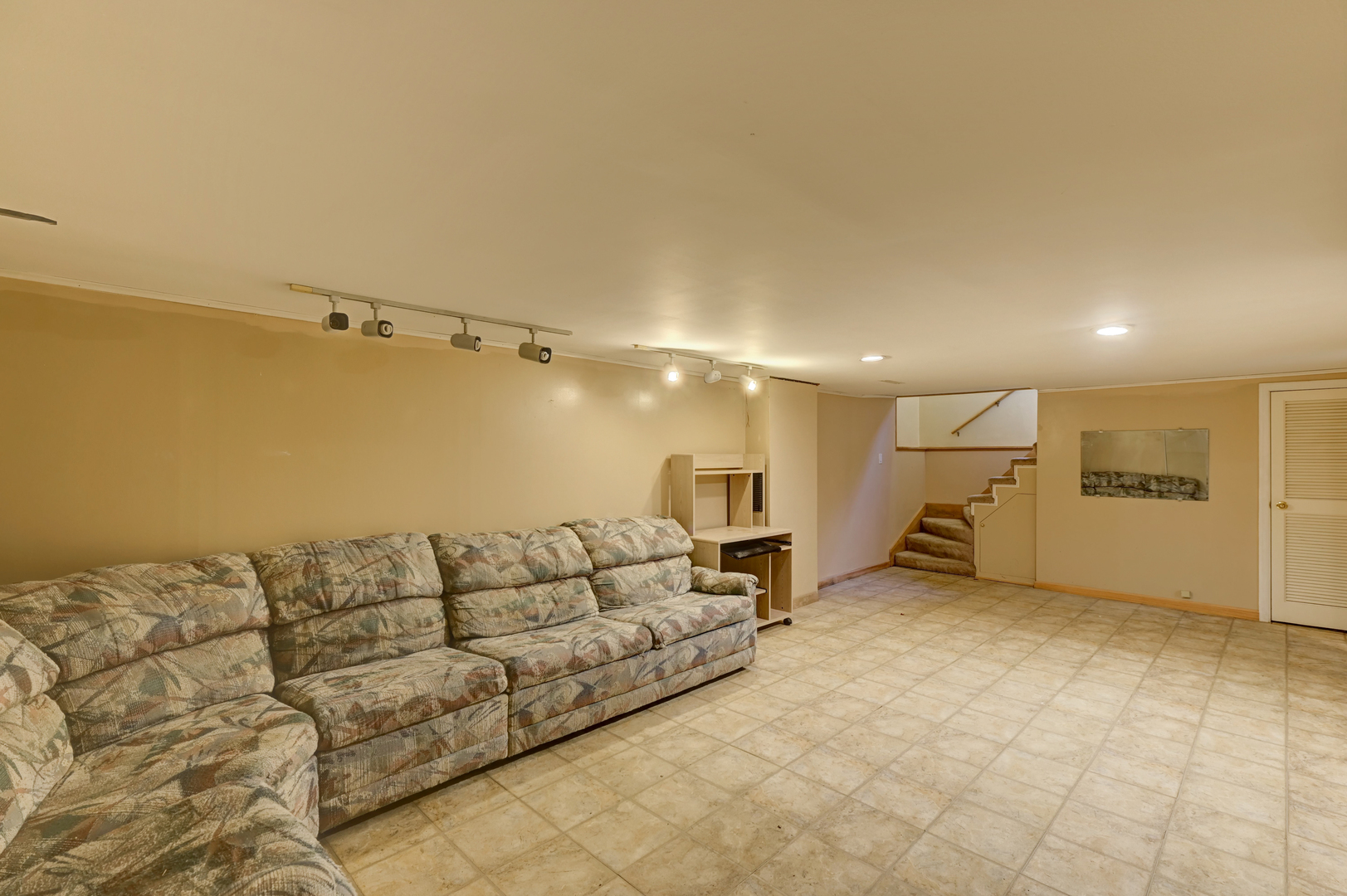 18281 Walter Street Lansing, IL 60438 - Photo 11 of 15 a living room with couches and kitchen view