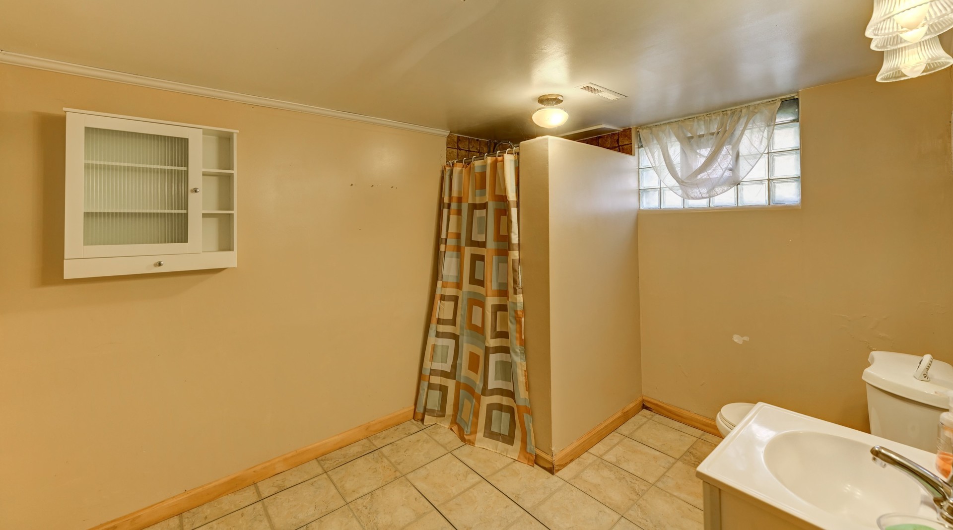 18281 Walter Street Lansing, IL 60438 - Photo 13 of 15 a view of bathroom with a shower and a sink