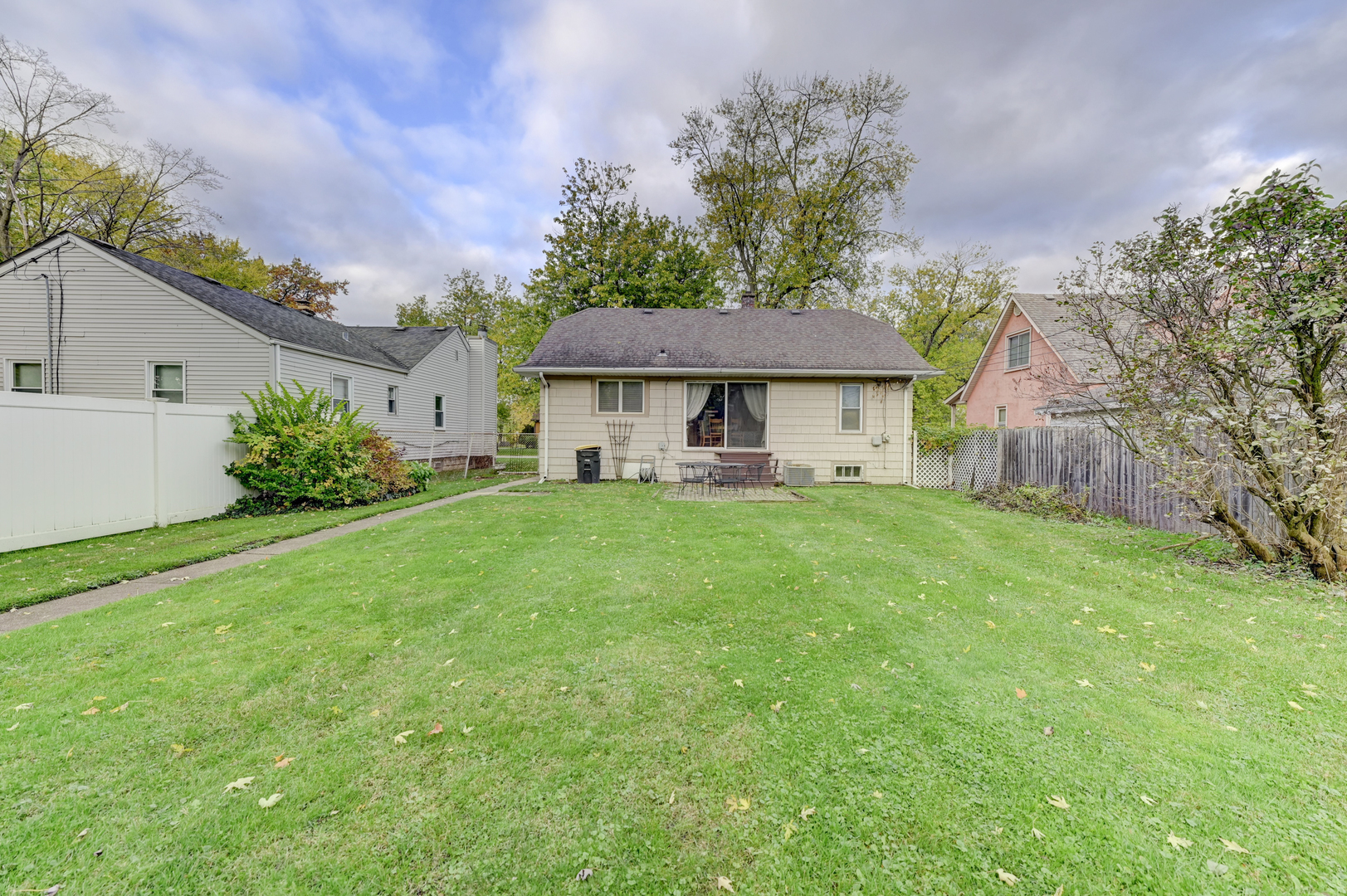 18281 Walter Street Lansing, IL 60438 - Photo 15 of 15 a front view of house with yard and green space