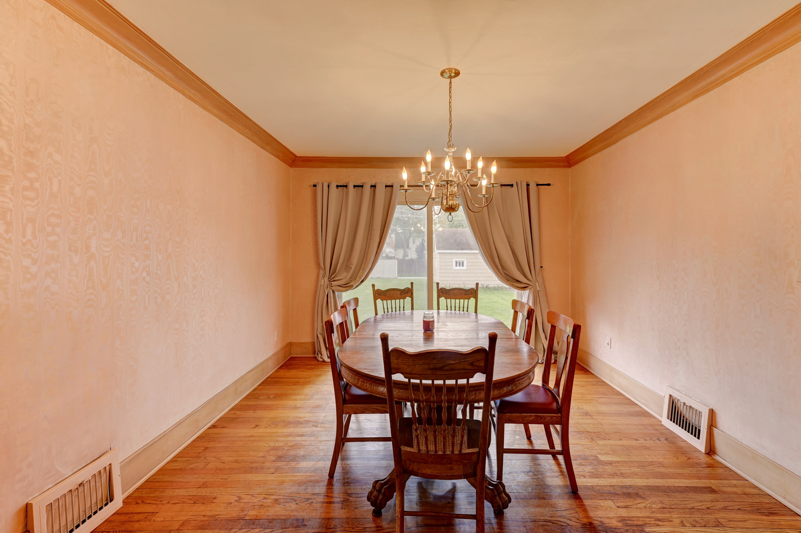 18281 Walter Street Lansing, IL 60438 - Photo 4 of 15 a view of a dining room with furniture and wooden floor