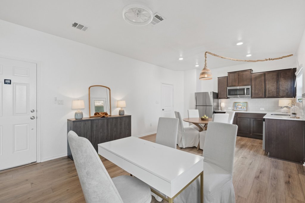 1233 Sweetspire Street Leander, TX 78641 - Photo 23 of 40 Bright and inviting guest suite living room with an open layout and abundant natural light.