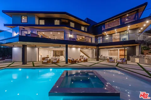 a view of a building with sitting area