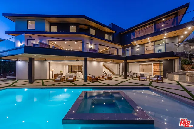 a view of a building with sitting area