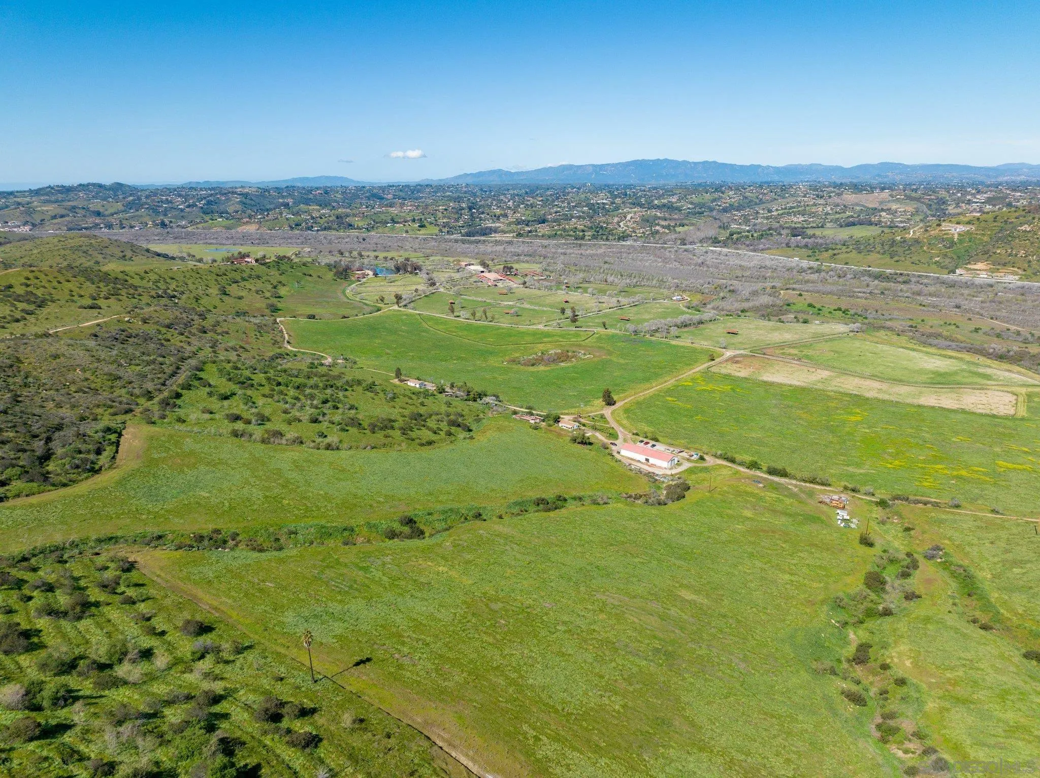 5820 West Lilac Road Bonsall, CA 92003 - Photo 15 of 34 a view of a city with an ocean