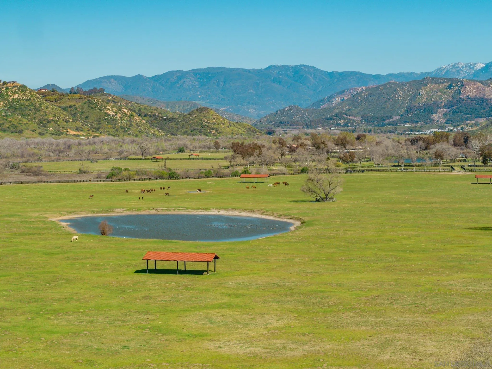 5820 West Lilac Road Bonsall, CA 92003 - Photo 3 of 34 a view of an aerial view of ocean and a mountain