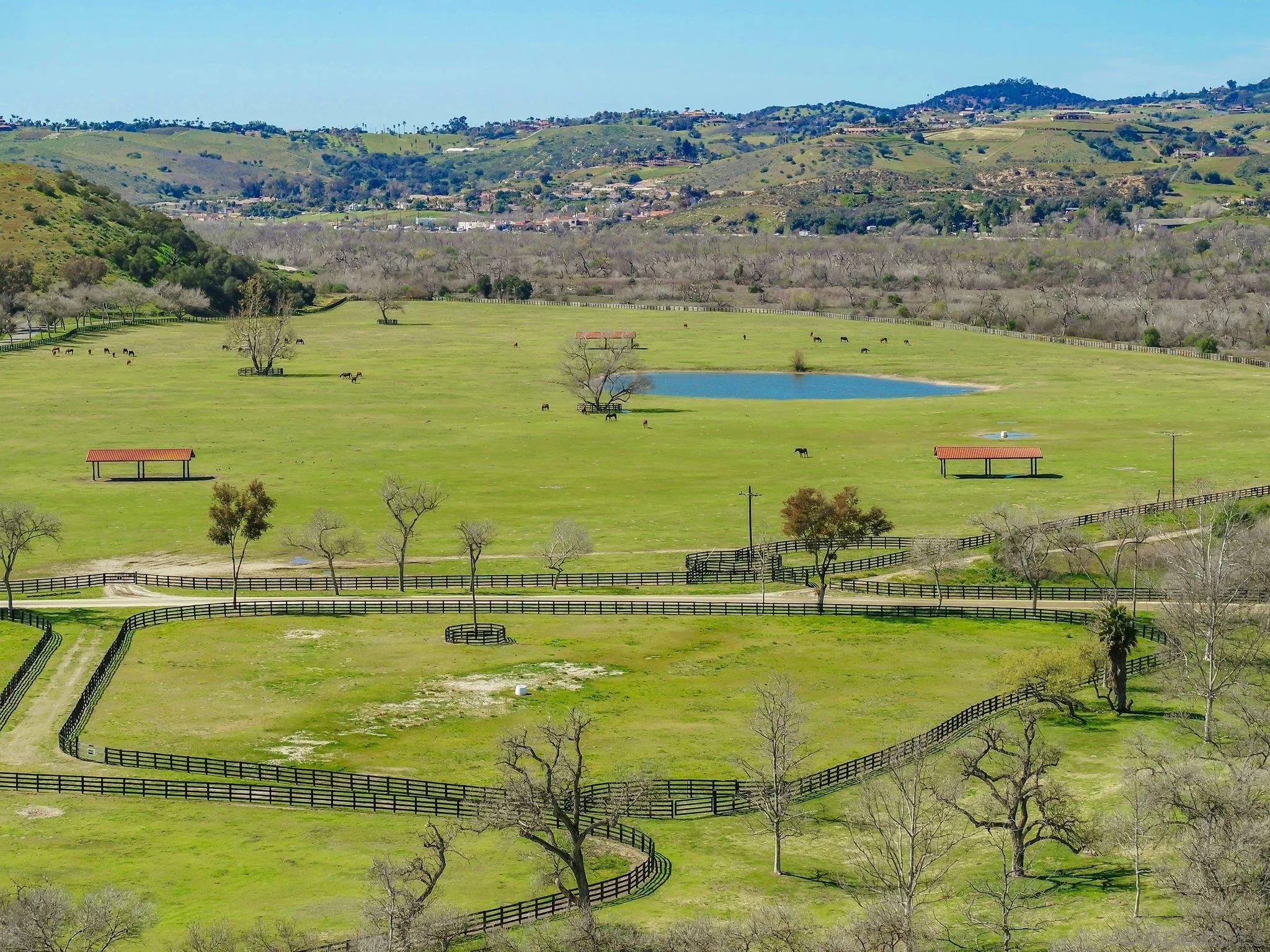 5820 West Lilac Road Bonsall, CA 92003 - Photo 31 of 34 a view of a swimming pool with an ocean view