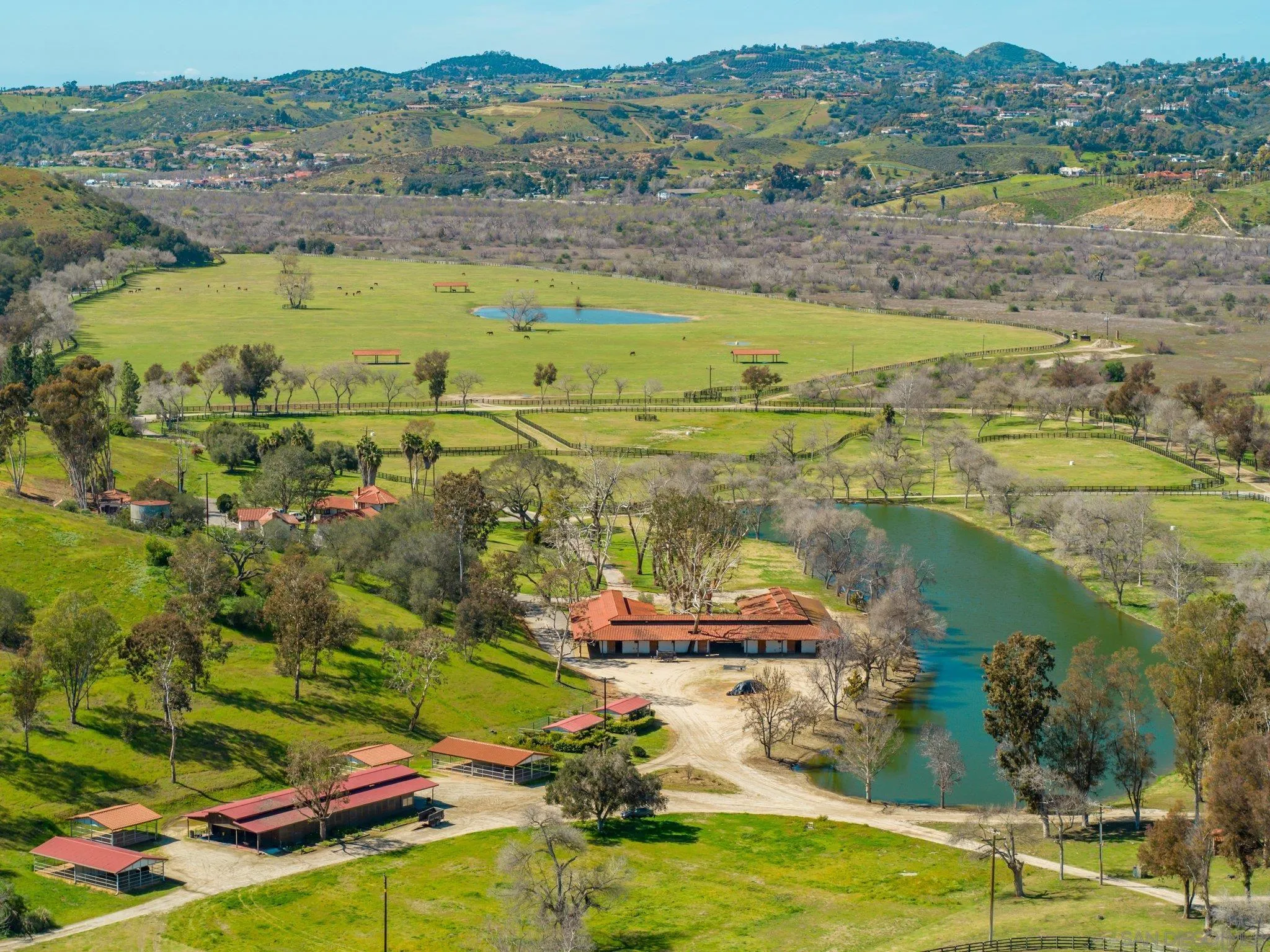 5820 West Lilac Road Bonsall, CA 92003 - Photo 6 of 34 an aerial view of residential houses with outdoor space