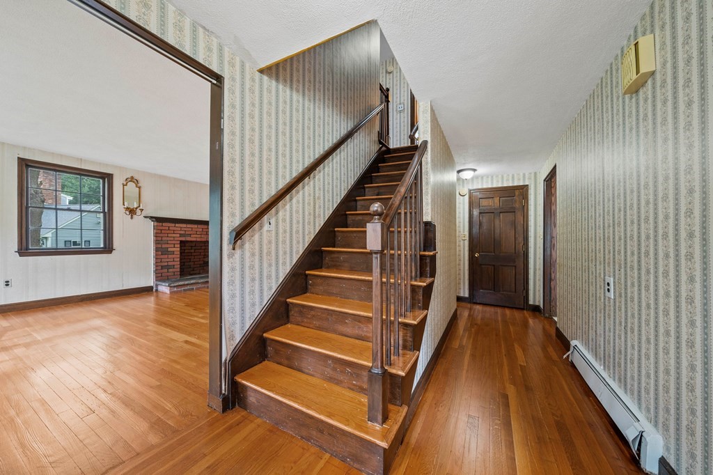 3 Winfield Road Hingham, MA 02043 - Photo 19 of 39 a view of staircase with wooden floor and staircase