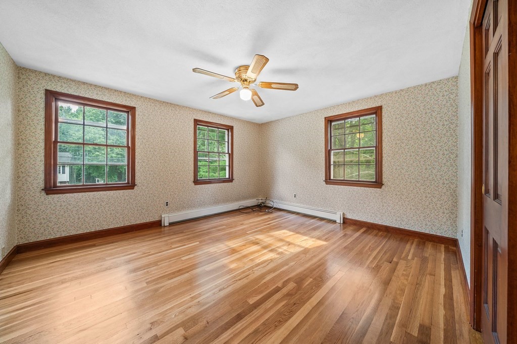 3 Winfield Road Hingham, MA 02043 - Photo 21 of 39 a view of empty room with wooden floor and fan