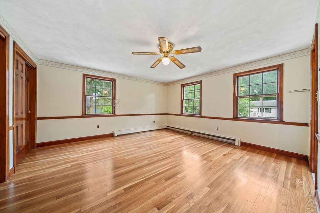 3 Winfield Road Hingham, MA 02043 - Photo 24 of 39 an empty room with wooden floor and windows