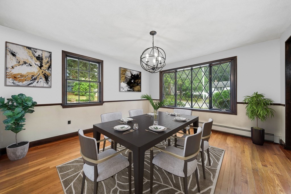3 Winfield Road Hingham, MA 02043 - Photo 5 of 39 a view of a dining room with furniture window and wooden floor