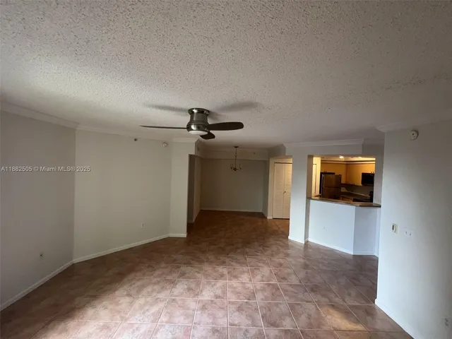 a view of a livingroom with a flat screen tv