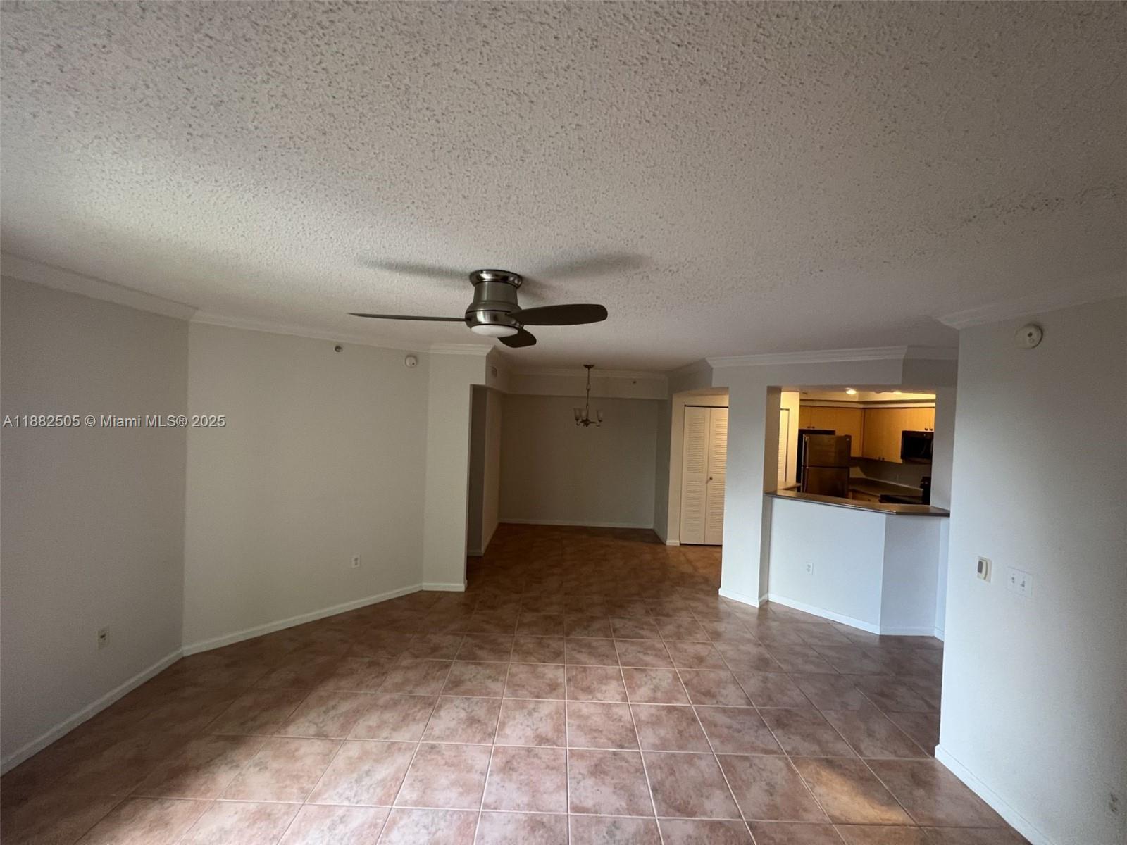 1919 Van Buren Street, Unit 408A Hollywood, FL 33020 - Photo 5 of 19 a view of a livingroom with a flat screen tv