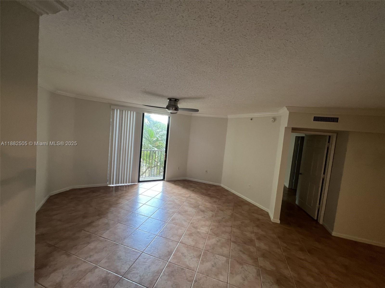 1919 Van Buren Street, Unit 408A Hollywood, FL 33020 - Photo 6 of 19 an empty room with entrance and windows