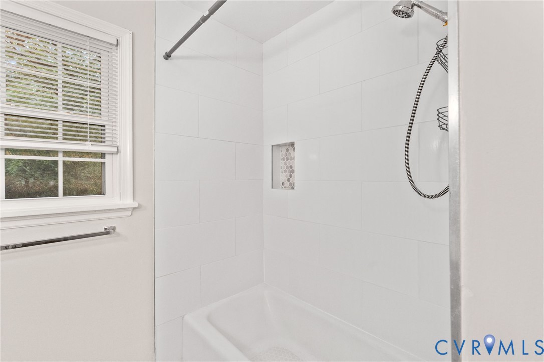 3151 Mountclair Road Chester, VA 23831 - Photo 31 of 36 Bathtub-shower combination featuring white subway