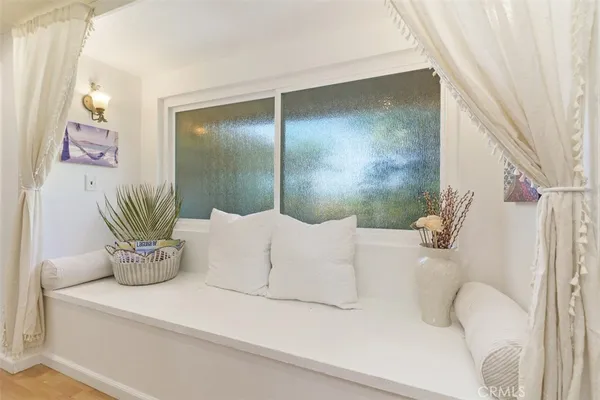 a bathroom with a potted plant