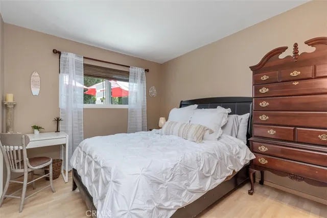 a bedroom with a bed and a closet