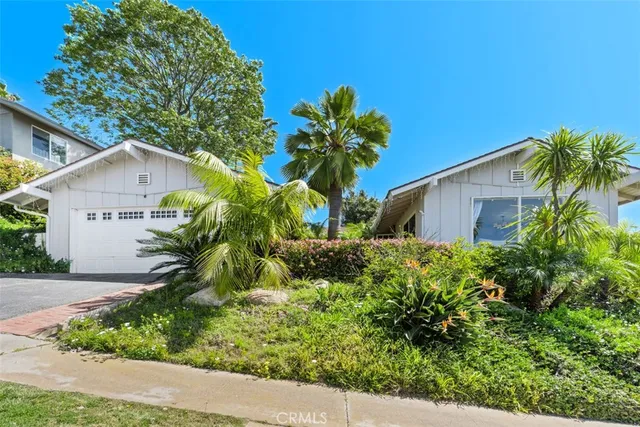 a plant that is in front of house