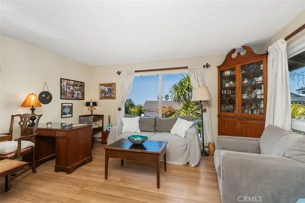 a living room with furniture and window