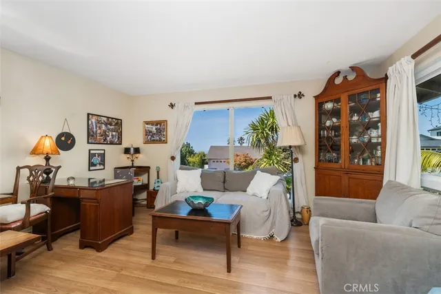 a living room with furniture and window