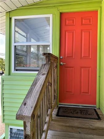 a view of entryway with wooden floor