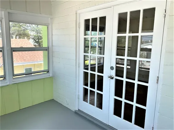 a view of a room with a large window