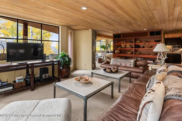 a bedroom with bed and window