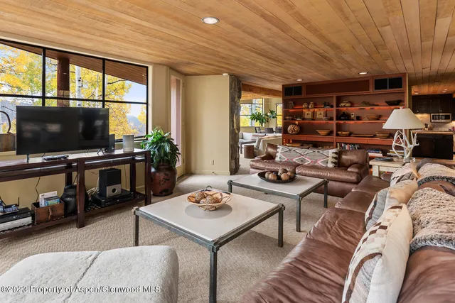 a bedroom with bed and window