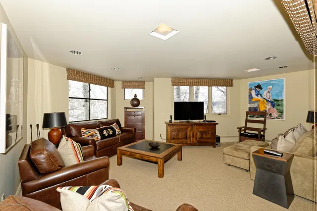 a bathroom with a granite countertop sink mirror and a